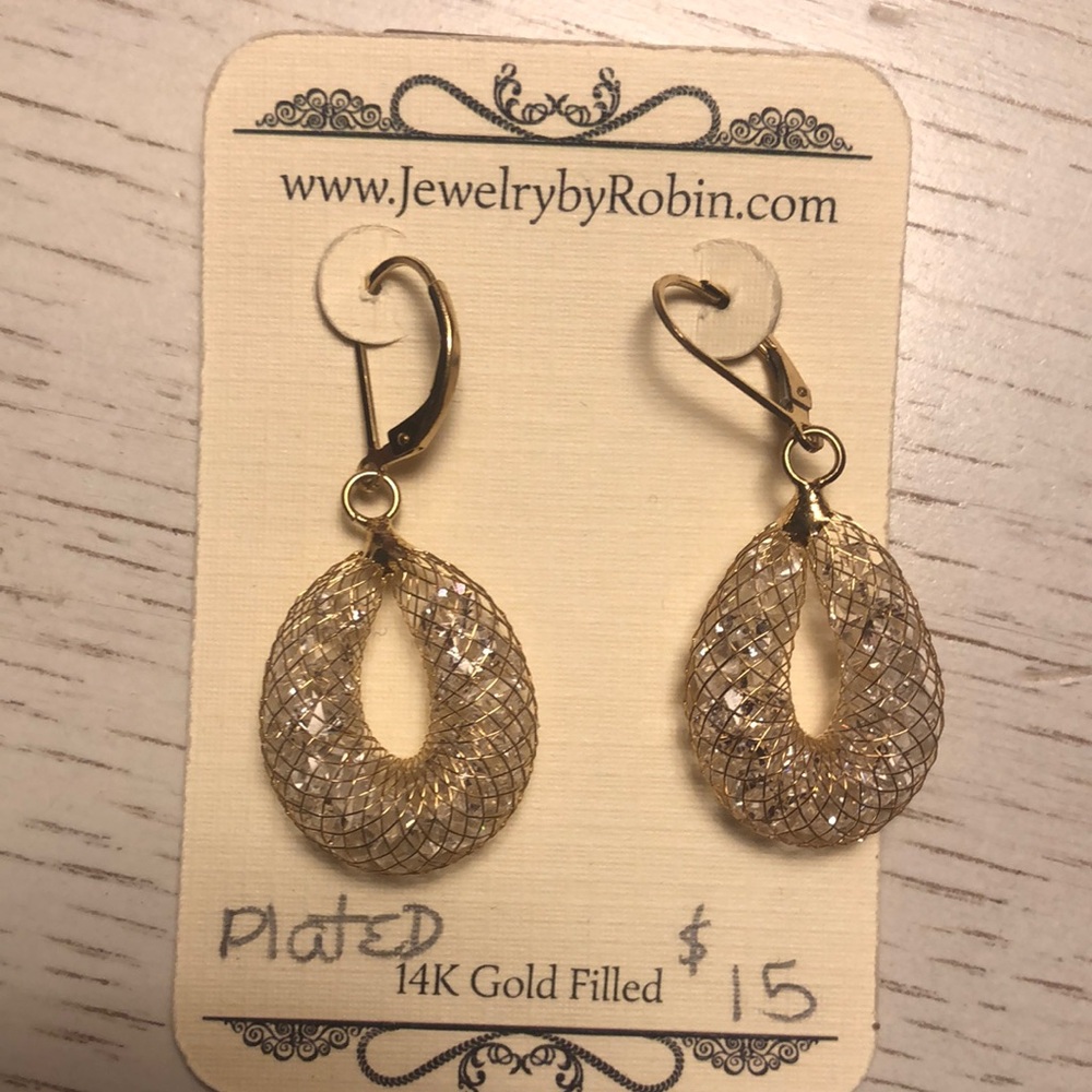 New dangling pierced earrings. Never worn.